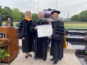 Retired medical professional receives degree